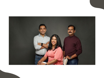 Three people posing for a professional portrait.